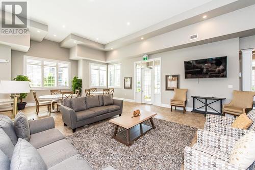 414 - 1440 Main Street E, Milton (Dempsey), ON - Indoor Photo Showing Living Room