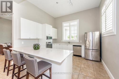 414 - 1440 Main Street E, Milton (Dempsey), ON - Indoor Photo Showing Kitchen With Stainless Steel Kitchen