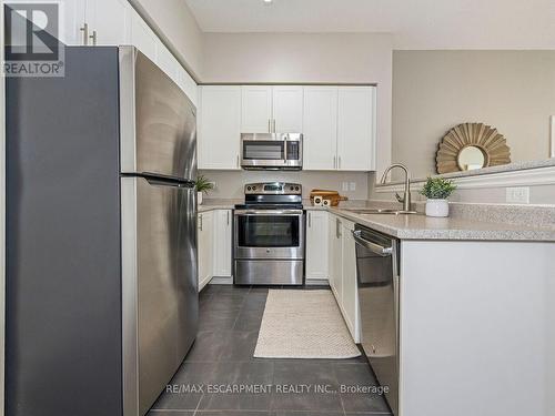 414 - 1440 Main Street E, Milton (Dempsey), ON - Indoor Photo Showing Kitchen With Stainless Steel Kitchen