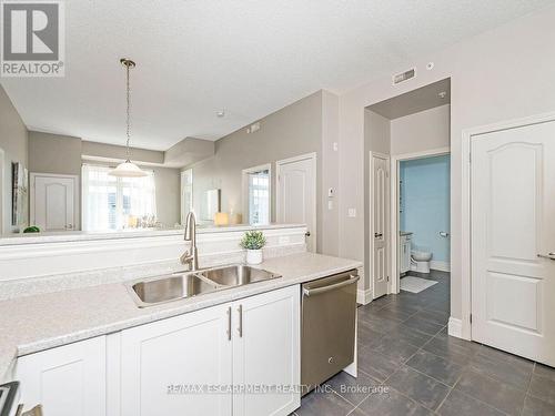 414 - 1440 Main Street E, Milton (Dempsey), ON - Indoor Photo Showing Kitchen With Double Sink