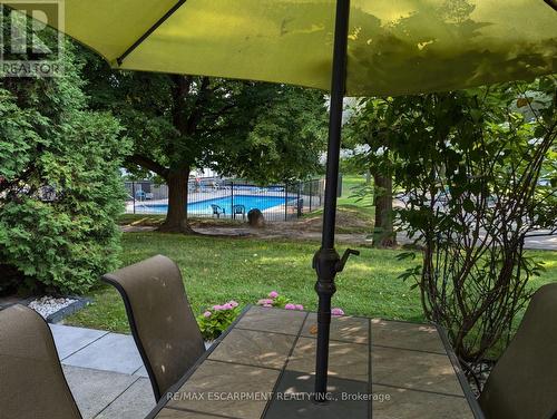 77 - 1485 Gulleden Drive, Mississauga (Applewood), ON - Outdoor With In Ground Pool