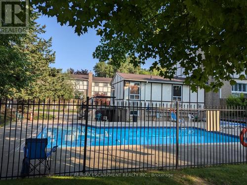 77 - 1485 Gulleden Drive, Mississauga, ON - Outdoor With In Ground Pool