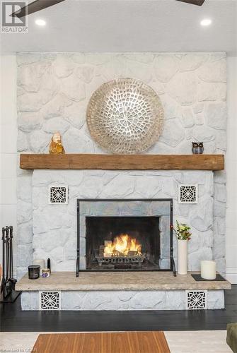 12889 15Th Sideroad, Georgetown, ON - Indoor Photo Showing Living Room With Fireplace