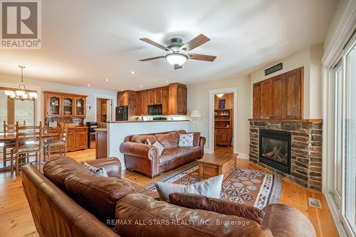 94 Wilkinson Drive, Kawartha Lakes, ON - Indoor Photo Showing Living Room With Fireplace