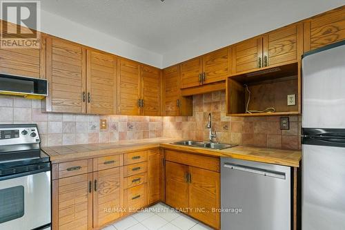 1907 - 500 Green Road, Hamilton (Stoney Creek), ON - Indoor Photo Showing Kitchen With Double Sink