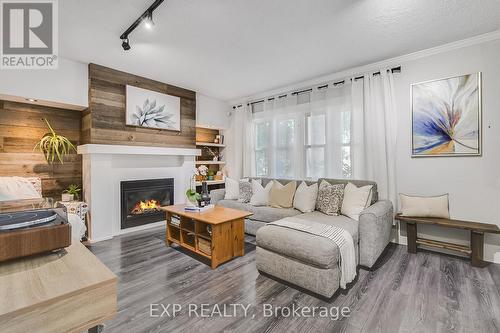 11 Sheldon Avenue S, Kitchener, ON - Indoor Photo Showing Living Room With Fireplace