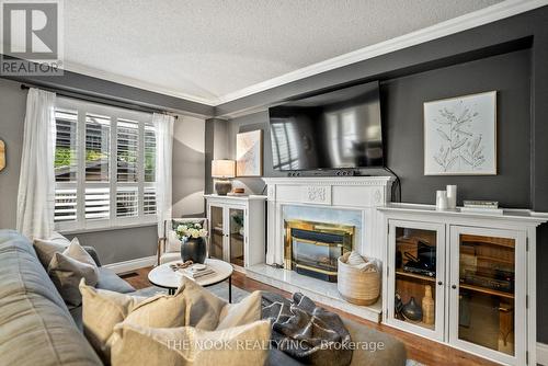 5 Found Court, Clarington (Courtice), ON - Indoor Photo Showing Living Room With Fireplace