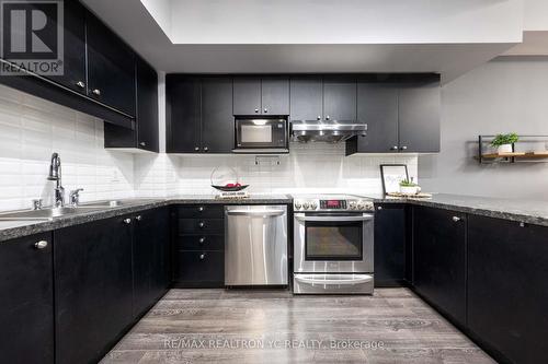 110 - 38 Cedarland Drive, Markham (Unionville), ON - Indoor Photo Showing Kitchen With Double Sink With Upgraded Kitchen