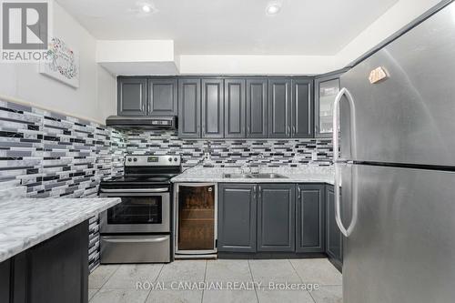 10 - 3600 Morning Star Drive, Mississauga (Malton), ON - Indoor Photo Showing Kitchen With Upgraded Kitchen