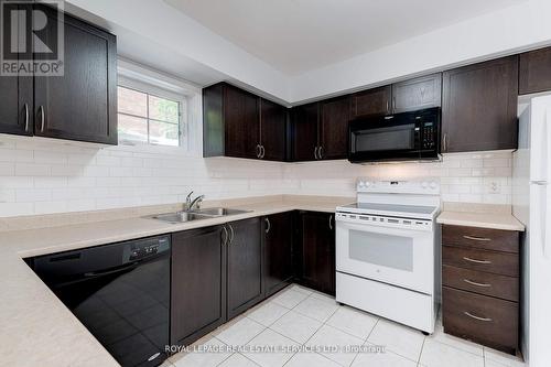 20 - 2460 Post Road, Oakville (Uptown Core), ON - Indoor Photo Showing Kitchen With Double Sink