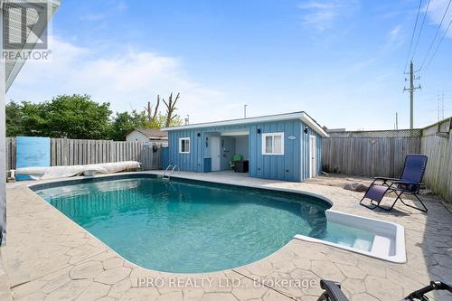 128 Homestead Place, Kitchener, ON - Outdoor With In Ground Pool