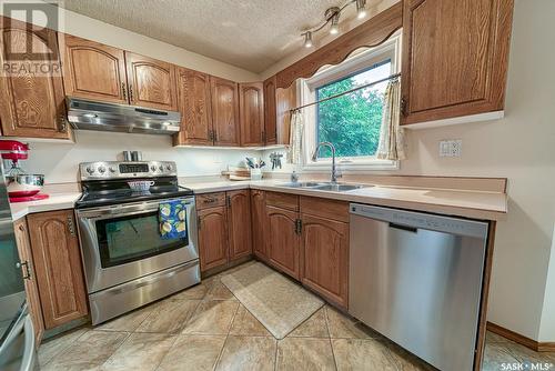 142 Calypso Drive, Moose Jaw, SK - Indoor Photo Showing Kitchen With Double Sink