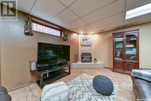 142 Calypso Drive, Moose Jaw, SK - Indoor Photo Showing Living Room With Fireplace