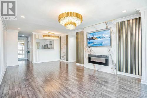 Ph208 - 8 Lee Centre Drive, Toronto (Woburn), ON - Indoor Photo Showing Living Room With Fireplace