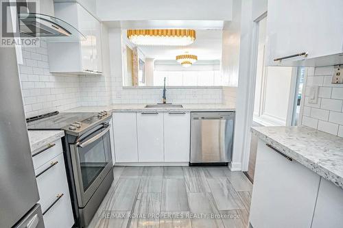 Ph208 - 8 Lee Centre Drive, Toronto (Woburn), ON - Indoor Photo Showing Kitchen With Upgraded Kitchen