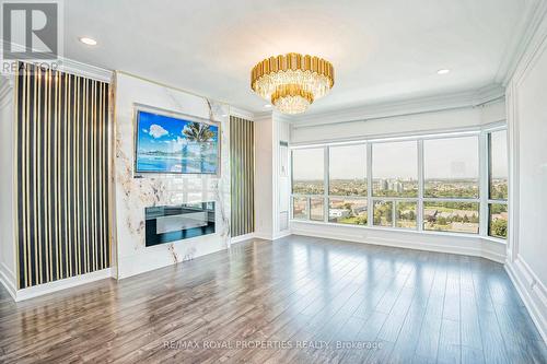 Ph208 - 8 Lee Centre Drive, Toronto (Woburn), ON - Indoor Photo Showing Other Room With Fireplace