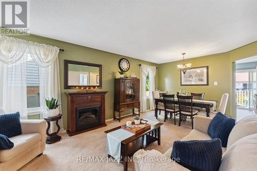 390 Elmwood Court, Oshawa (Samac), ON - Indoor Photo Showing Living Room With Fireplace