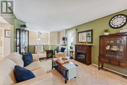 390 Elmwood Court, Oshawa (Samac), ON - Indoor Photo Showing Living Room With Fireplace