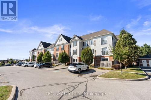 101 - 98 Aspen Springs Drive, Clarington (Bowmanville), ON - Outdoor With Facade