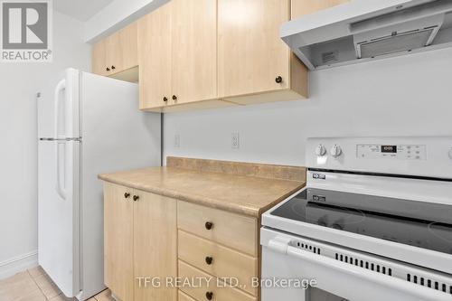 101 - 98 Aspen Springs Drive, Clarington (Bowmanville), ON - Indoor Photo Showing Kitchen