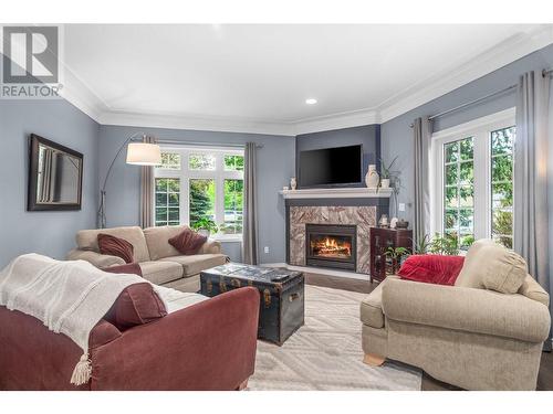 3962 Summerside Court, Kelowna, BC - Indoor Photo Showing Living Room With Fireplace