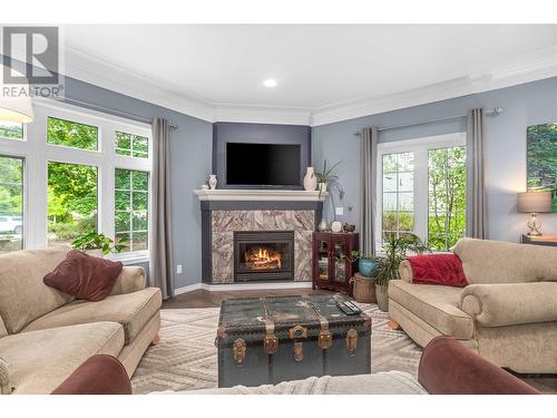 3962 Summerside Court, Kelowna, BC - Indoor Photo Showing Living Room With Fireplace