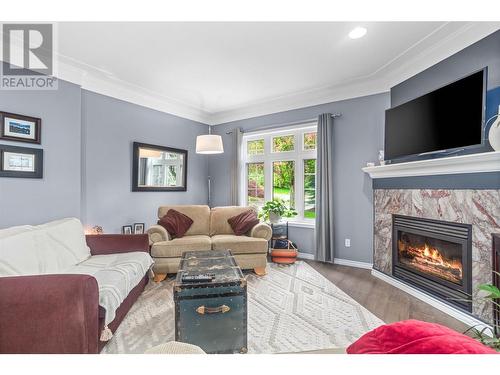 3962 Summerside Court, Kelowna, BC - Indoor Photo Showing Living Room With Fireplace