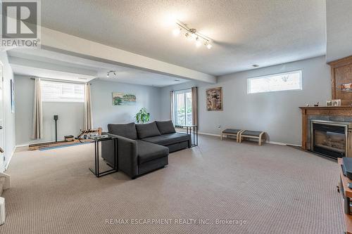 248 Guildwood Drive, Hamilton (Gurnett), ON - Indoor Photo Showing Basement With Fireplace