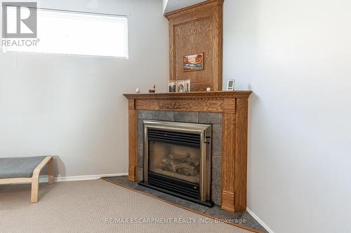 248 Guildwood Drive, Hamilton (Gurnett), ON - Indoor Photo Showing Living Room With Fireplace