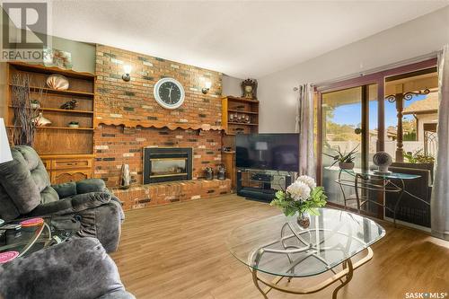 2479 Swayze Crescent, Regina, SK - Indoor Photo Showing Living Room With Fireplace