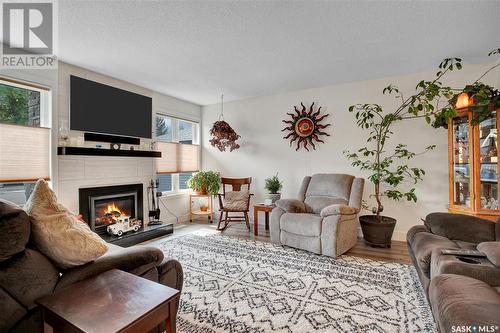 310 J.J. Thiessen Way, Saskatoon, SK - Indoor Photo Showing Living Room With Fireplace