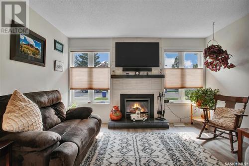 310 J.J. Thiessen Way, Saskatoon, SK - Indoor Photo Showing Living Room With Fireplace