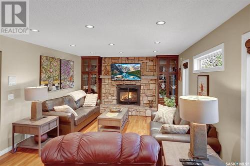 1379 Maple Grove Crescent N, Regina, SK - Indoor Photo Showing Living Room With Fireplace