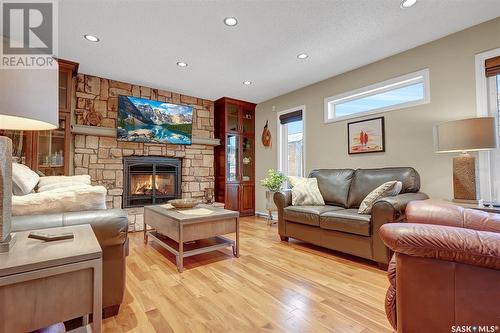 1379 Maple Grove Crescent N, Regina, SK - Indoor Photo Showing Living Room With Fireplace