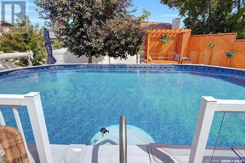 1379 Maple Grove Crescent N, Regina, SK - Outdoor With Above Ground Pool With Backyard