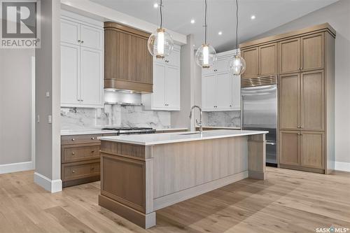 302 404 Cartwright Street, Saskatoon, SK - Indoor Photo Showing Kitchen With Upgraded Kitchen