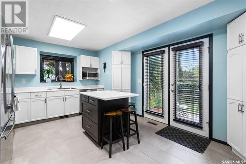 242 Wickenden Crescent, Saskatoon, SK - Indoor Photo Showing Kitchen With Double Sink