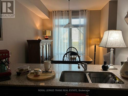 406 - 710 King Street W, Oshawa (Vanier), ON - Indoor Photo Showing Kitchen With Double Sink