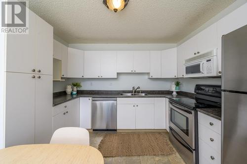 143 3233 Mcgill Crescent, Prince George, BC - Indoor Photo Showing Kitchen With Double Sink