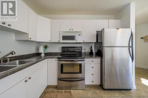 143 3233 Mcgill Crescent, Prince George, BC - Indoor Photo Showing Kitchen With Double Sink