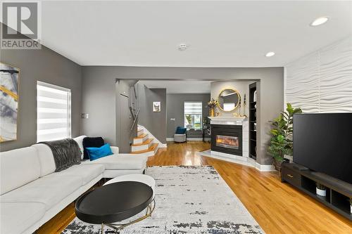 859 Monmouth, Windsor, ON - Indoor Photo Showing Living Room With Fireplace