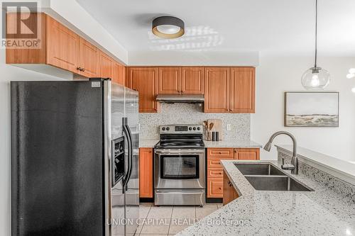 7156 Lowville Heights, Mississauga (Lisgar), ON - Indoor Photo Showing Kitchen With Stainless Steel Kitchen With Double Sink