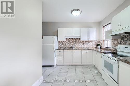 114 Tisdale Street N, Hamilton, ON - Indoor Photo Showing Kitchen With Double Sink