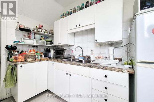 114 Tisdale Street N, Hamilton, ON - Indoor Photo Showing Kitchen With Double Sink