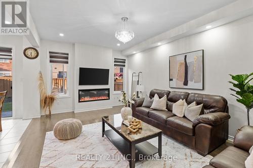 6 Ogston Crescent N, Whitby, ON - Indoor Photo Showing Living Room With Fireplace