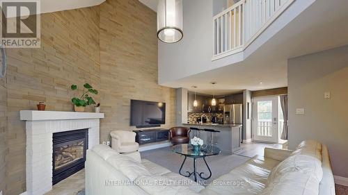 162 - 51 Trott Boulevard, Collingwood, ON - Indoor Photo Showing Living Room With Fireplace