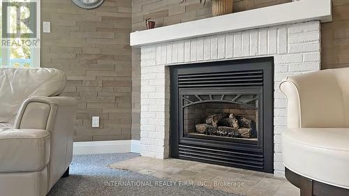 162 - 51 Trott Boulevard, Collingwood, ON - Indoor Photo Showing Living Room With Fireplace