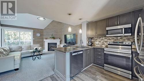 162 - 51 Trott Boulevard, Collingwood, ON - Indoor With Fireplace