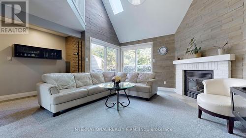 162 - 51 Trott Boulevard, Collingwood, ON - Indoor Photo Showing Living Room With Fireplace