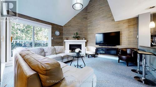 162 - 51 Trott Boulevard, Collingwood, ON - Indoor Photo Showing Living Room With Fireplace